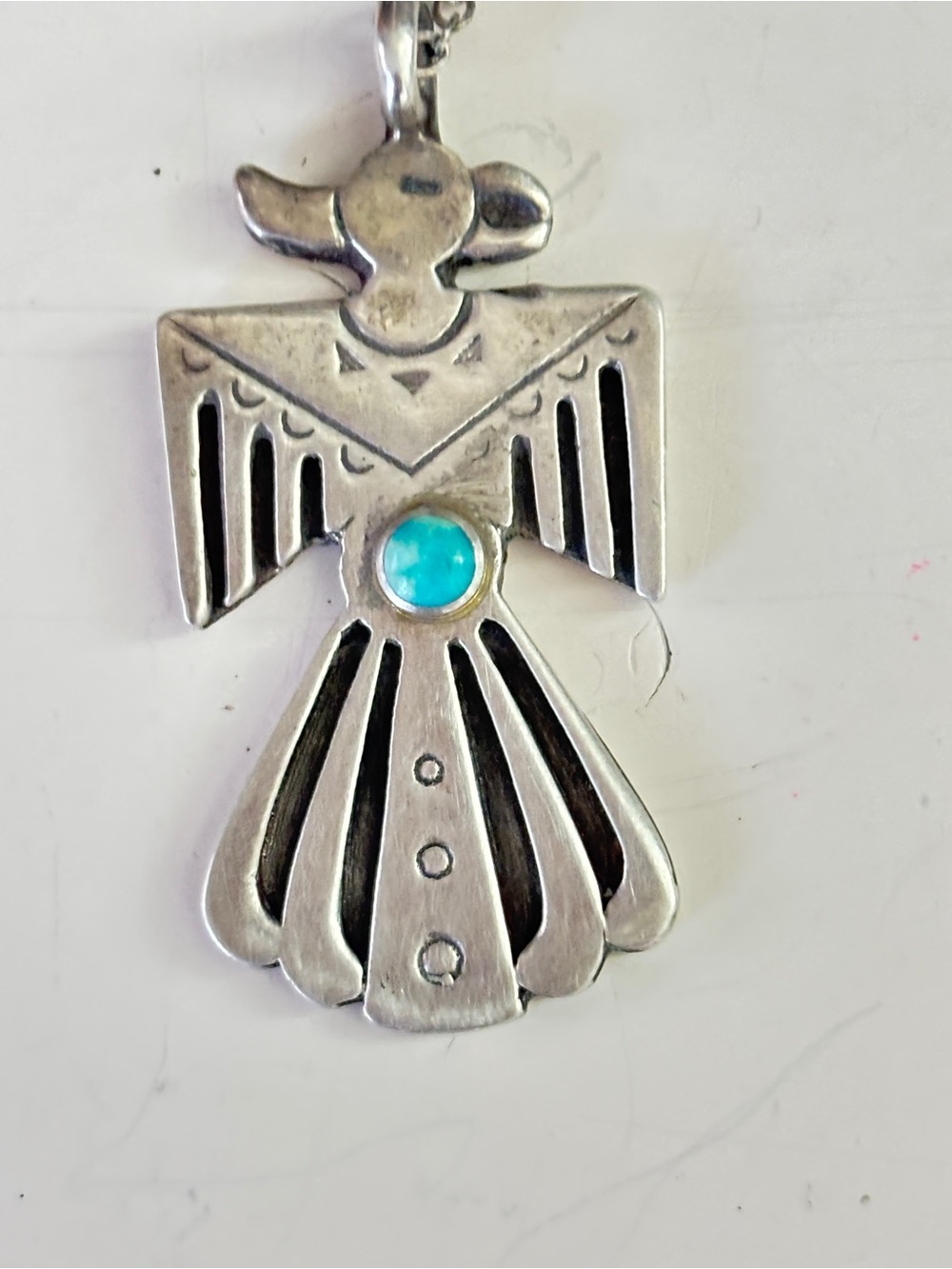 Sterling Silver Angel Pendant Necklace with Turquoise Accent stone.